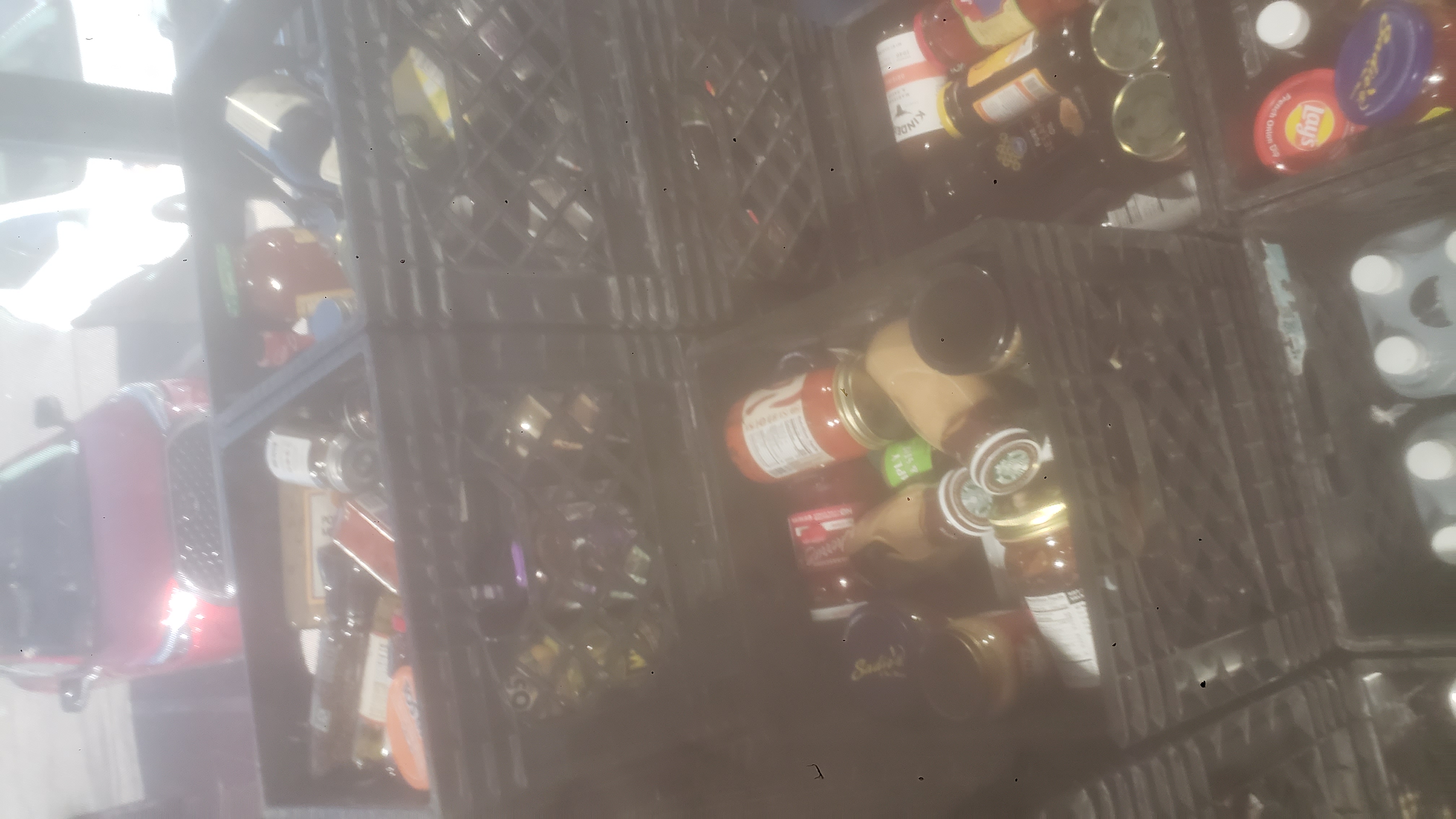 Crates filled with glass jars.